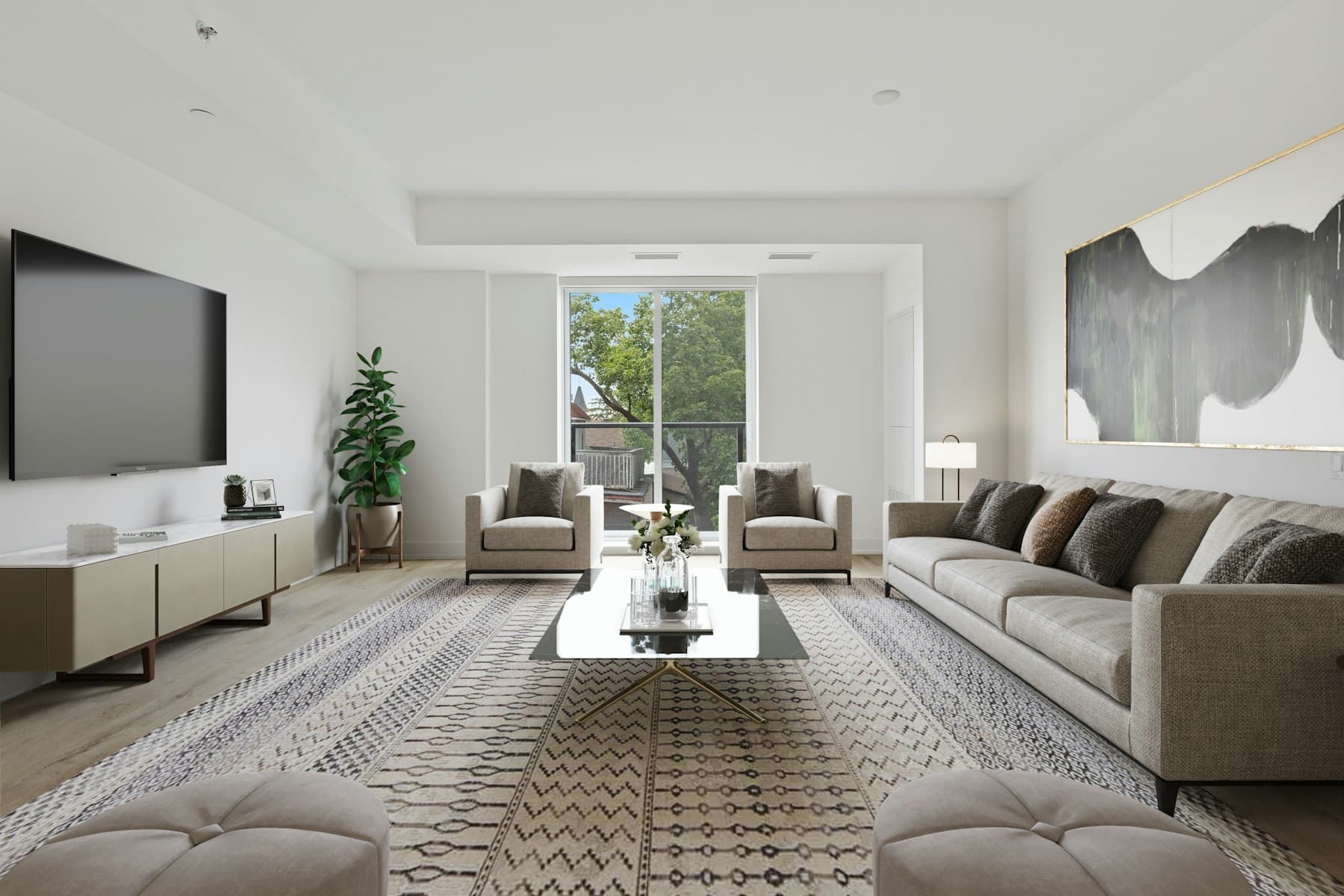 A living area with a patterned rug beside a tall window